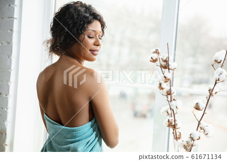 Beauty Day. Woman doing her daily skincare routine at home 61671134