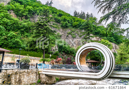 Footbridge across the Borjomula river in Borjomi, Georgia 61671864