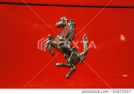 Selected focused of Ferrari car brand emblem and logos. Ferrari is an Italian luxury sports car manufacturer based in Maranello. Selected focused of Ferrari car brand emblem and logos. Ferrari is an Italian luxury sports car manufacturer based in Maranello. 61672037