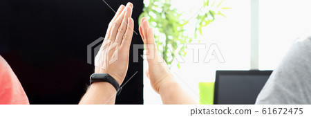 Two male hand in office hive five Two male hand in office hive five 61672475