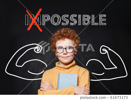 Smart kid with redhead hair and glasses Smart kid with redhead hair and glasses 61673173