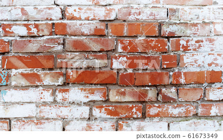 Rustic red brick background with white paint 61673349