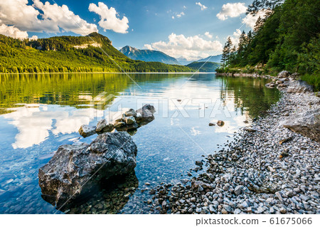Coastline in Altausseer lake, distant Dachstein Coastline in Altausseer lake, distant Dachstein 61675066