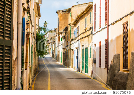 Narrow street of the Arta city, Mallorca 61675076