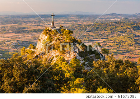 Cross on a hill seen from Sant Salvador church Cross on a hill seen from Sant Salvador church 61675085