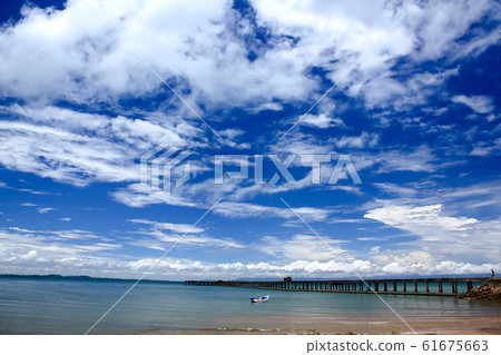 Concrete bridges stretched into the sea. Concrete bridges stretched into the sea. 61675663