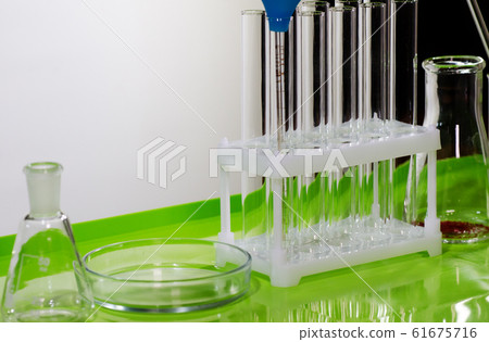 A desk at a chemistry lab or clinic. 61675716