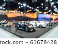 Blurred background of new cars displayed in luxury 61678428