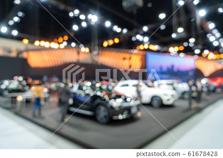 Blurred background of new cars displayed in luxury Blurred background of new cars displayed in luxury 61678428