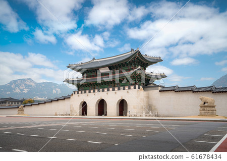 Gyeongbokgung palace gate and wall with nice sky Gyeongbokgung palace gate and wall with nice sky 61678434