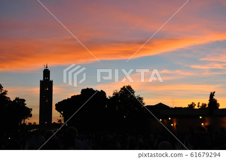 Morocco, Marrakesh, Djemaa el Fna square, Qutubia sunset view Morocco, Marrakesh, Djemaa el Fna square, Qutubia sunset view 61679294