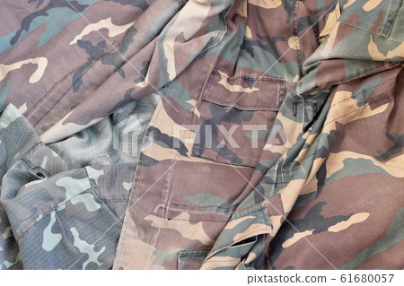 Camouflage background texture as backdrop for 61680057