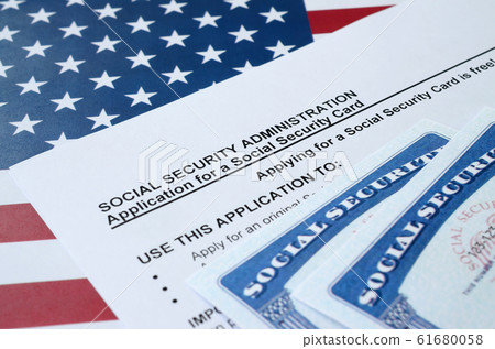 United States social security number cards lies on 61680058