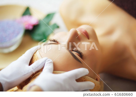 Beauty and Care. Spa Salon. Girl With Towel On Head. The Woman W 61680660