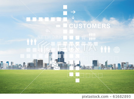 Natural background with modern cityscape green field and media interface Natural background with modern cityscape green field and media interface 61682893