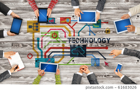 Top view of businesspeople sitting at table and using gadgets Top view of businesspeople sitting at table and using gadgets 61683026