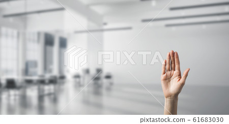 Choosing gesture of person in elegant modern interior in sunshin Choosing gesture of person in elegant modern interior in sunshin 61683030