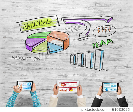 Top view of businesspeople sitting at table and using gadgets Top view of businesspeople sitting at table and using gadgets 61683035