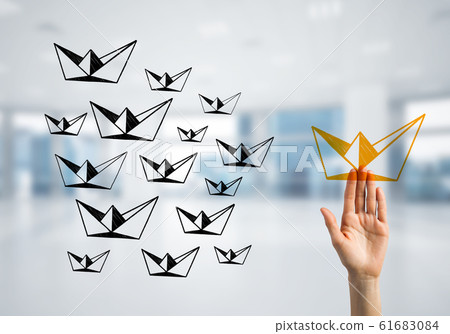 Concept of leadership and teamworking with many icons and one of them standing out 61683084