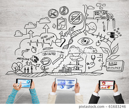 Top view of businesspeople sitting at table and using gadgets Top view of businesspeople sitting at table and using gadgets 61683246