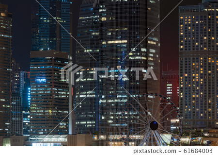 Closeup Hong Kong Cityscape skyscraper at night time, business financial district, tourist and travel destination, architecture building and landmark concept Closeup Hong Kong Cityscape skyscraper at night time, business financial district, tourist and travel destination, architecture building and landmark concept 61684003