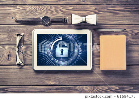 Gentleman kit of tablet watch glasses and notebook on wooden table 61684173