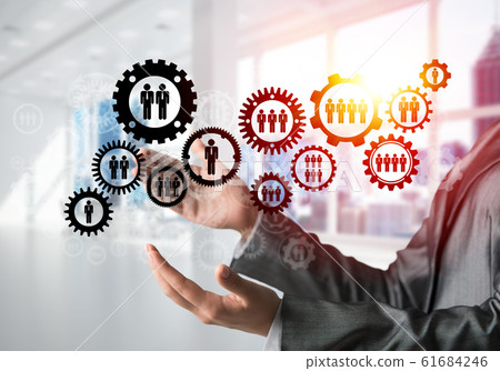Cogwheels and gears mechanism as social communication concept Cogwheels and gears mechanism as social communication concept 61684246