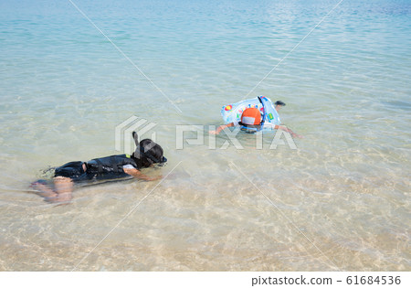 Children snorkeling in the sea Children snorkeling in the sea 61684536