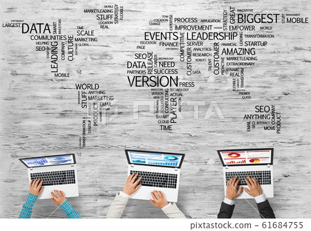 Top view of businesspeople sitting at table and using gadgets Top view of businesspeople sitting at table and using gadgets 61684755