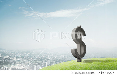 Money making and wealth concept presented by stone dollar symbol on natural landscape 61684997