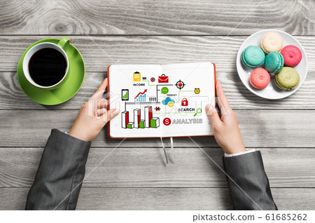 Businesswoman and her business notes Businesswoman and her business notes 61685262