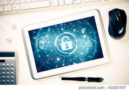 Web security and technology concept with tablet pc on wooden tab 61685597