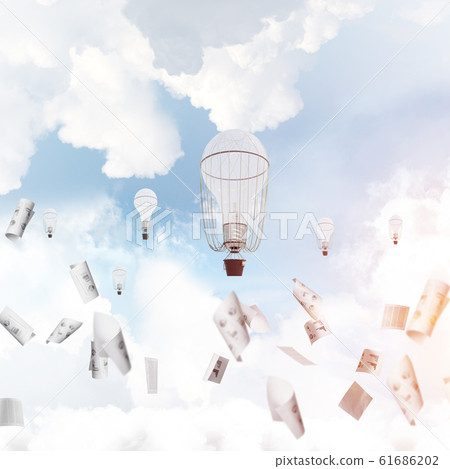 Flying hot air balloons in the air. 61686202