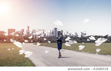 Business woman with old TV instead of head. Business woman with old TV instead of head. 61686538