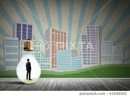 Businessman trapped in bulb Businessman trapped in bulb 61686992