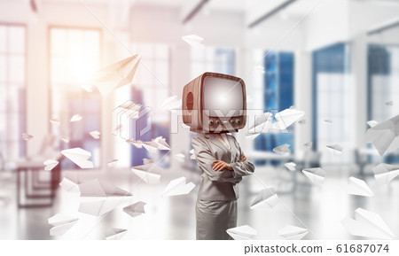 Business woman with old TV instead of head. Business woman with old TV instead of head. 61687074
