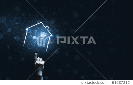 Conceptual image with hand pointing at house or main page icon on dark background Conceptual image with hand pointing at house or main page icon on dark background 61687215