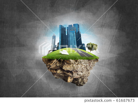 Modern cityscape with towers and skyscrapers on green part of land 61687673