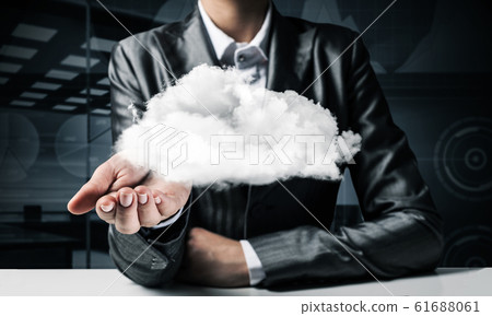 Woman presenting cloud in her hand. 61688061