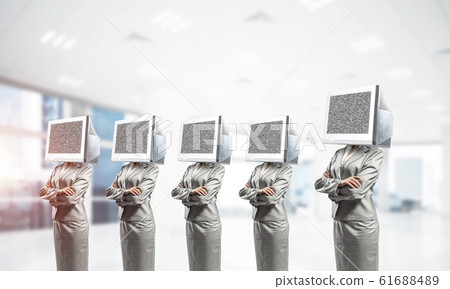 Business women with monitors instead of head. Business women with monitors instead of head. 61688489