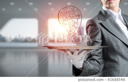 Concept of lightbulb as symbol of new idea. Concept of lightbulb as symbol of new idea. 61688540