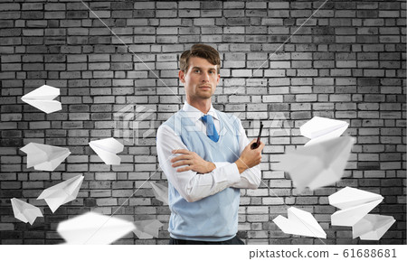 Conceptual image of young businessman. Conceptual image of young businessman. 61688681