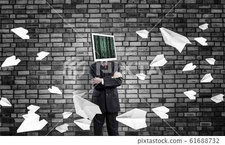 Businessman with monitor instead of head. Businessman with monitor instead of head. 61688732