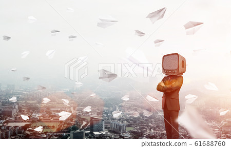 Businessman with old TV instead of head. 61688760