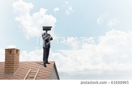 Concept of security and privacy protection with camera headed man Concept of security and privacy protection with camera headed man 61688965