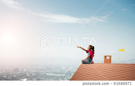 Concept of careless happy childhood with girl showing touch gesture Concept of careless happy childhood with girl showing touch gesture 61688971
