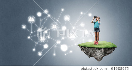Concept of careless happy childhood with girl looking in binocul Concept of careless happy childhood with girl looking in binocul 61688975