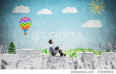 Businessman dreaming about future business. Businessman dreaming about future business. 61688984