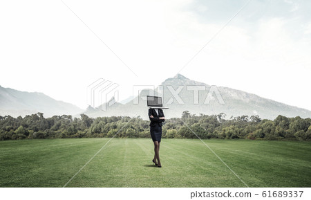 Business woman with laptop instead of head. 61689337