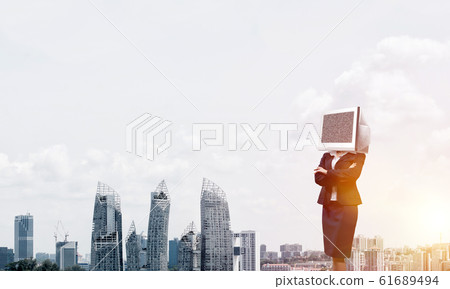 Business woman with monitor instead of head. Business woman with monitor instead of head. 61689494